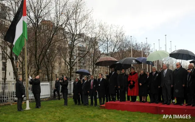 Palestinian President Mahmoud Abbas attends the Palestinian flag raising ceremony, at the UNESCO headquarters in Paris, Tuesday Dec. 13, 2011. Palestine was admitted as a member of the U.N. Educational, Scientific and Cu...