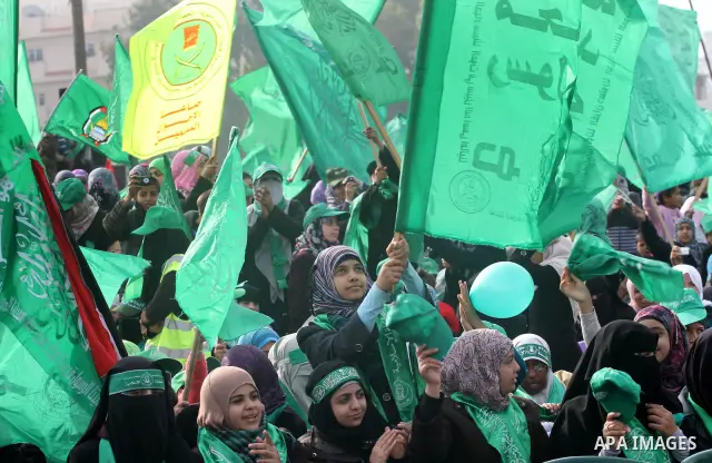 Thousands of Hamas supporters gather to celebrating marking the Islamist movement's 24nd anniversary at el-Qatiba yard in Gaza city on Dec 14, 2011. the Islamist movement of Hamas take over ruling at Gaza strip since Jun...