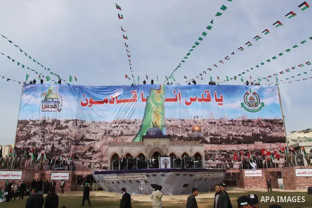 Thousands of Hamas supporters gather to celebrating marking the Islamist movement's 24nd anniversary at el-Qatiba yard in Gaza city on Dec 14, 2011. the Islamist movement of Hamas take over ruling at Gaza strip since Jun...