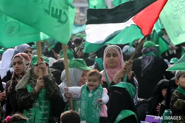 Thousands of Hamas supporters gather to celebrating marking the Islamist movement's 24nd anniversary at el-Qatiba yard in Gaza city on Dec 14, 2011. the Islamist movement of Hamas take over ruling at Gaza strip since Jun...
