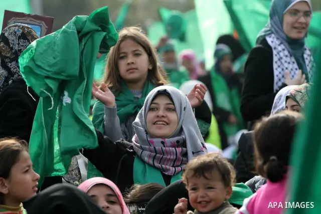 Thousands of Hamas supporters gather to celebrating marking the Islamist movement's 24nd anniversary at el-Qatiba yard in Gaza city on Dec 14, 2011. the Islamist movement of Hamas take over ruling at Gaza strip since Jun...