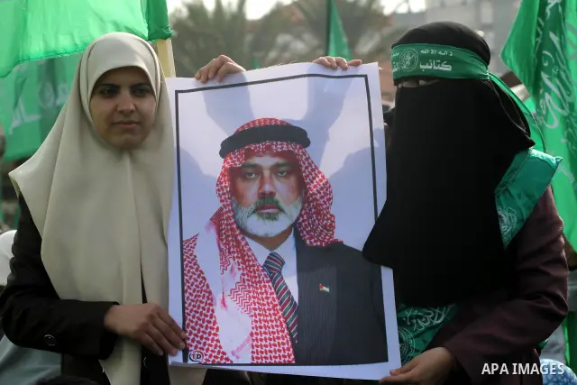Thousands of Hamas supporters gather to celebrating marking the Islamist movement's 24nd anniversary at el-Qatiba yard in Gaza city on Dec 14, 2011. the Islamist movement of Hamas take over ruling at Gaza strip since Jun...