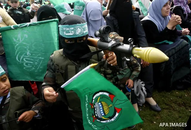 Thousands of Hamas supporters gather to celebrating marking the Islamist movement's 24nd anniversary at el-Qatiba yard in Gaza city on Dec 14, 2011. the Islamist movement of Hamas take over ruling at Gaza strip since Jun...