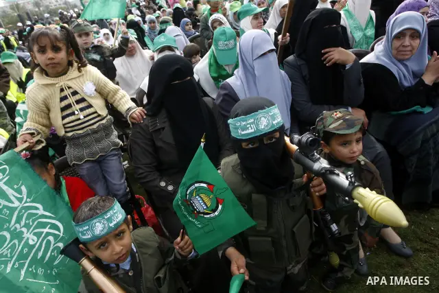 Thousands of Hamas supporters gather to celebrating marking the Islamist movement's 24nd anniversary at el-Qatiba yard in Gaza city on Dec 14, 2011. the Islamist movement of Hamas take over ruling at Gaza strip since Jun...