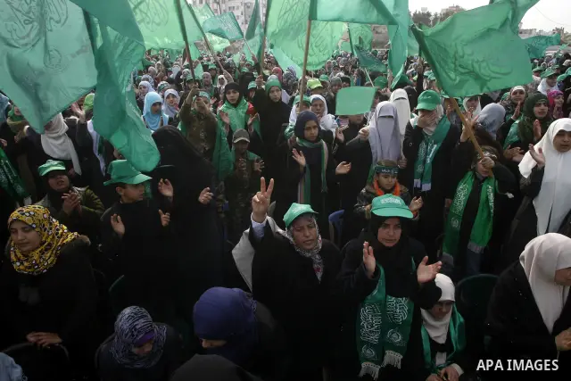Thousands of Hamas supporters gather to celebrating marking the Islamist movement's 24nd anniversary at el-Qatiba yard in Gaza city on Dec 14, 2011. the Islamist movement of Hamas take over ruling at Gaza strip since Jun...