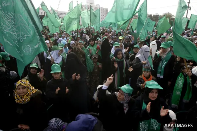 Thousands of Hamas supporters gather to celebrating marking the Islamist movement's 24nd anniversary at el-Qatiba yard in Gaza city on Dec 14, 2011. the Islamist movement of Hamas take over ruling at Gaza strip since Jun...