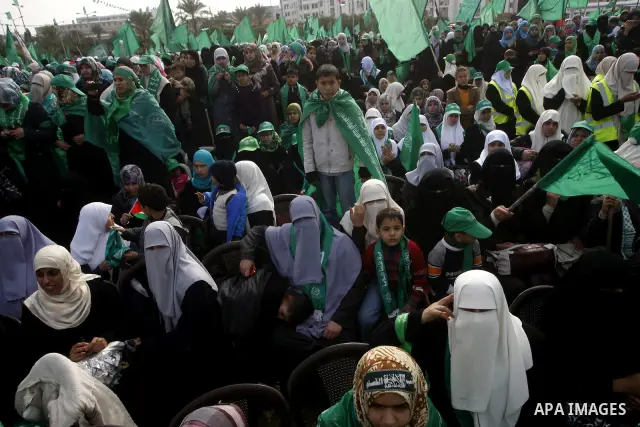 Thousands of Hamas supporters gather to celebrating marking the Islamist movement's 24nd anniversary at el-Qatiba yard in Gaza city on Dec 14, 2011. the Islamist movement of Hamas take over ruling at Gaza strip since Jun...