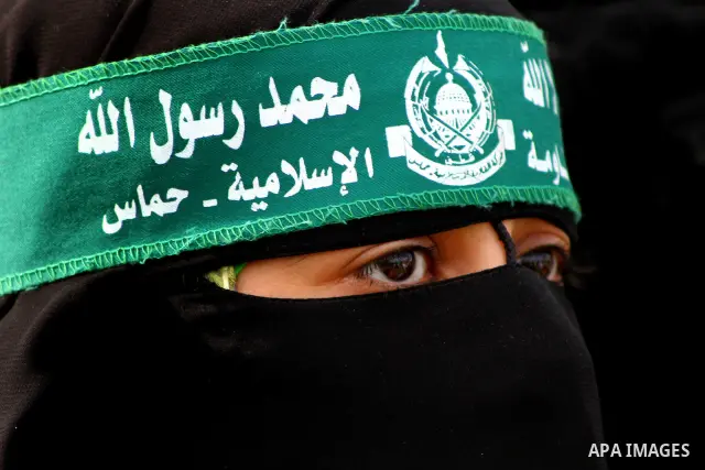 Thousands of Hamas supporters gather to celebrating marking the Islamist movement's 24nd anniversary at el-Qatiba yard in Gaza city on Dec 14, 2011. the Islamist movement of Hamas take over ruling at Gaza strip since Jun...