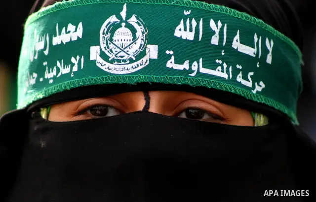 Thousands of Hamas supporters gather to celebrating marking the Islamist movement's 24nd anniversary at el-Qatiba yard in Gaza city on Dec 14, 2011. the Islamist movement of Hamas take over ruling at Gaza strip since Jun...