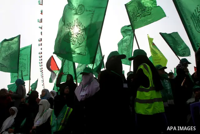Thousands of Hamas supporters gather to celebrating marking the Islamist movement's 24nd anniversary at el-Qatiba yard in Gaza city on Dec 14, 2011. the Islamist movement of Hamas take over ruling at Gaza strip since Jun...