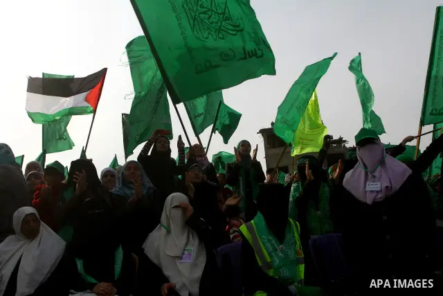 Thousands of Hamas supporters gather to celebrating marking the Islamist movement's 24nd anniversary at el-Qatiba yard in Gaza city on Dec 14, 2011. the Islamist movement of Hamas take over ruling at Gaza strip since Jun...