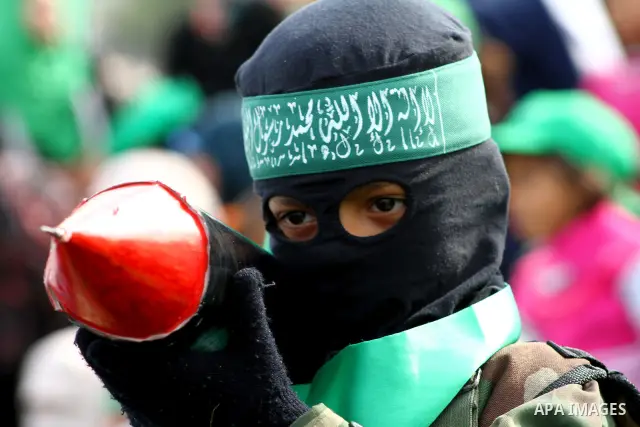 Thousands of Hamas supporters gather to celebrating marking the Islamist movement's 24nd anniversary at el-Qatiba yard in Gaza city on Dec 14, 2011. the Islamist movement of Hamas take over ruling at Gaza strip since Jun...