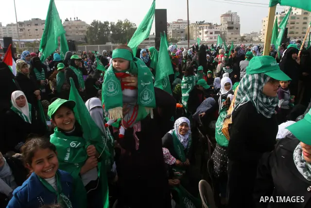 Thousands of Hamas supporters gather to celebrating marking the Islamist movement's 24nd anniversary at el-Qatiba yard in Gaza city on Dec 14, 2011. the Islamist movement of Hamas take over ruling at Gaza strip since Jun...