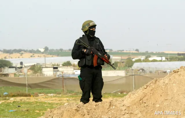 Palestinian Hamas militants patrol in the streets during the celebrations marking the Islamist movement's 24th founding anniversary, in the Rafah refugee camp in the southern Gaza Strip on December 14, 2011. Photo by Abe...