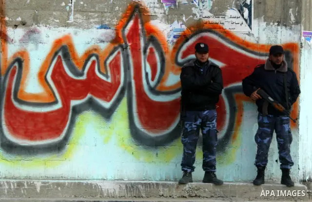 Palestinian Hamas policemen patrol in the streets during the celebrations marking the Islamist movement's 24th founding anniversary, in the Rafah refugee camp in the southern Gaza Strip on December 14, 2011. Photo by Abe...