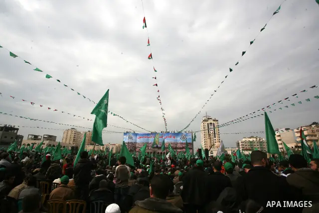 Thousands of Hamas supporters gather to celebrating marking the Islamist movement's 24nd anniversary at el-Qatiba yard in Gaza city on Dec 14, 2011. the Islamist movement of Hamas take over ruling at Gaza strip since Jun...