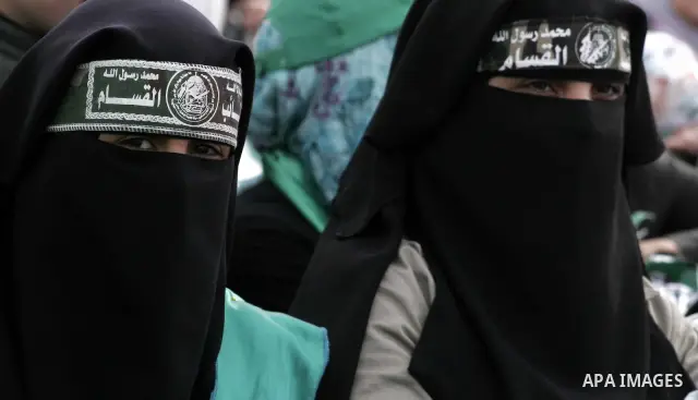 Thousands of Hamas supporters gather to celebrating marking the Islamist movement's 24nd anniversary at el-Qatiba yard in Gaza city on Dec 14, 2011. the Islamist movement of Hamas take over ruling at Gaza strip since Jun...