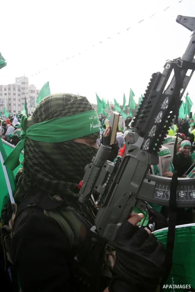 Thousands of Hamas supporters gather to celebrating marking the Islamist movement's 24nd anniversary at el-Qatiba yard in Gaza city on Dec 14, 2011. the Islamist movement of Hamas take over ruling at Gaza strip since Jun...