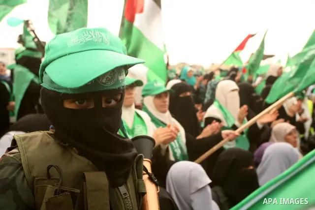 Thousands of Hamas supporters gather to celebrating marking the Islamist movement's 24nd anniversary at el-Qatiba yard in Gaza city on Dec 14, 2011. the Islamist movement of Hamas take over ruling at Gaza strip since Jun...