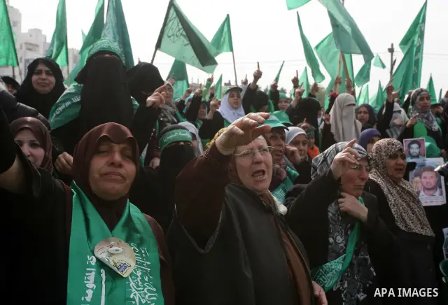 Thousands of Hamas supporters gather to celebrating marking the Islamist movement's 24nd anniversary at el-Qatiba yard in Gaza city on Dec 14, 2011. the Islamist movement of Hamas take over ruling at Gaza strip since Jun...