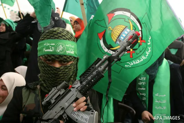Thousands of Hamas supporters gather to celebrating marking the Islamist movement's 24nd anniversary at el-Qatiba yard in Gaza city on Dec 14, 2011. the Islamist movement of Hamas take over ruling at Gaza strip since Jun...