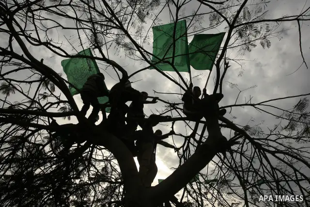 Thousands of Hamas supporters gather to celebrating marking the Islamist movement's 24nd anniversary at el-Qatiba yard in Gaza city on Dec 14, 2011. the Islamist movement of Hamas take over ruling at Gaza strip since Jun...