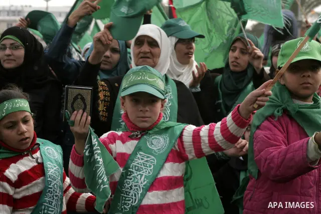 Thousands of Hamas supporters gather to celebrating marking the Islamist movement's 24nd anniversary at el-Qatiba yard in Gaza city on Dec 14, 2011. the Islamist movement of Hamas take over ruling at Gaza strip since Jun...