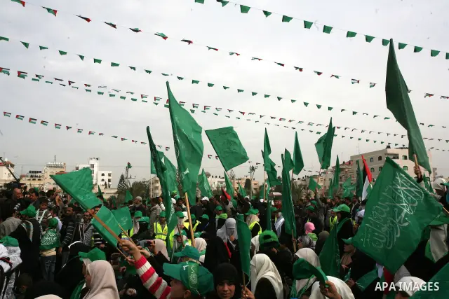 Thousands of Hamas supporters gather to celebrating marking the Islamist movement's 24nd anniversary at el-Qatiba yard in Gaza city on Dec 14, 2011. the Islamist movement of Hamas take over ruling at Gaza strip since Jun...