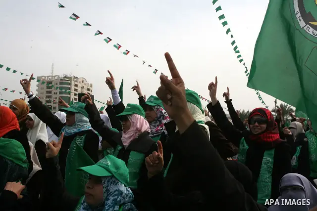 Thousands of Hamas supporters gather to celebrating marking the Islamist movement's 24nd anniversary at el-Qatiba yard in Gaza city on Dec 14, 2011. the Islamist movement of Hamas take over ruling at Gaza strip since Jun...