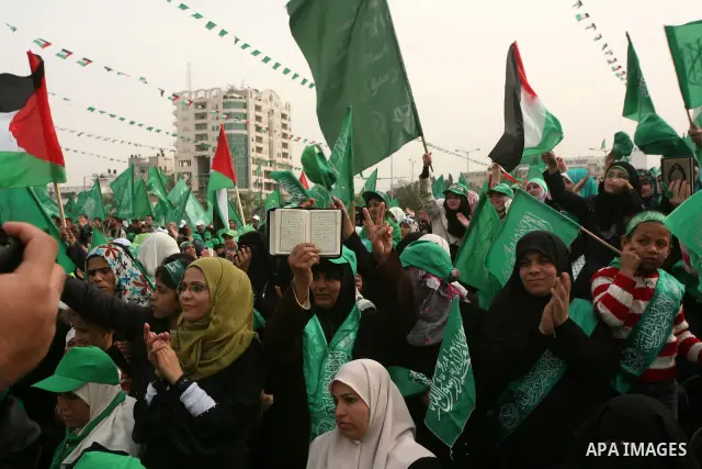 Thousands of Hamas supporters gather to celebrating marking the Islamist movement's 24nd anniversary at el-Qatiba yard in Gaza city on Dec 14, 2011. the Islamist movement of Hamas take over ruling at Gaza strip since Jun...