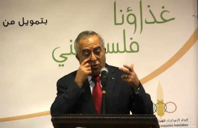 Palestinian Prime Minister Salam Fayyad attends the Palestinian Food Industries Association Week 2011 trade fair 'Our Food', from 15 to 18 December, in the West Bank City of Nablus, on 15 December 2011. 'Our Food' will c...