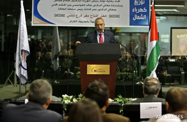 Palestinian Prime Minister Salam Fayyad attends the opening ceremony of the power station in the West Bank City of Nablus, on 15 December 2011.. Photo by Mustafa Abu Dayeh