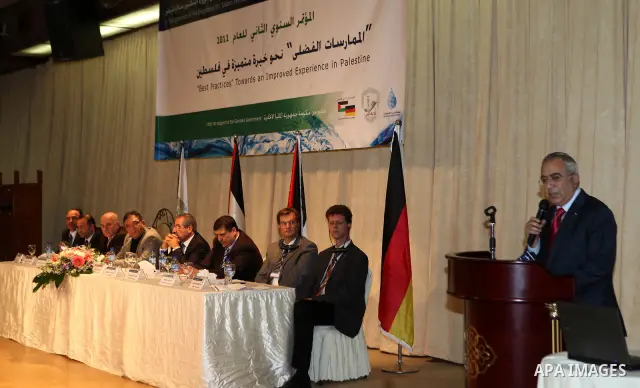 Palestinian Prime Minister Salam Fayyad attends a conference in the West Bank City of Nablus, on 15 December 2011.. Photo by Mustafa Abu Dayeh