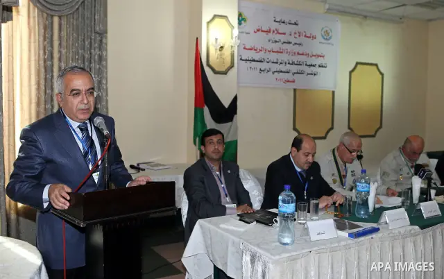 Palestinian prime minister, Salam Fayyad, attends conference of the scout movement in Palestine, in the West Bank city of Ramallah on Dec. 17, 2011. Photo by Mustafa Abu Dayeh