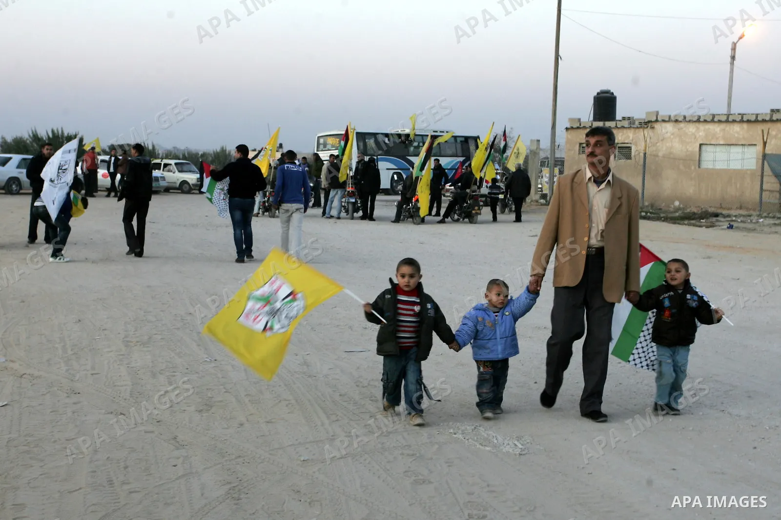 Relatives of Palestinian prisoners wait at Rafah crossing before their release from Israeli jails December 18, 2011. Israel plans to release 550 Palestinian prisoners on Sunday in the second stage of a deal with Hamas th...