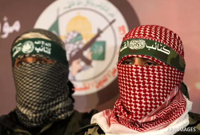 The spokesman of Ezzedine al-Qassam Brigade, the military wing of the Palestinian Islamist movement Hamas which rules Gaza, Abo Obeda gives a press conference in Gaza City on Dec. 18, 2011, as Israel plans to release 550...