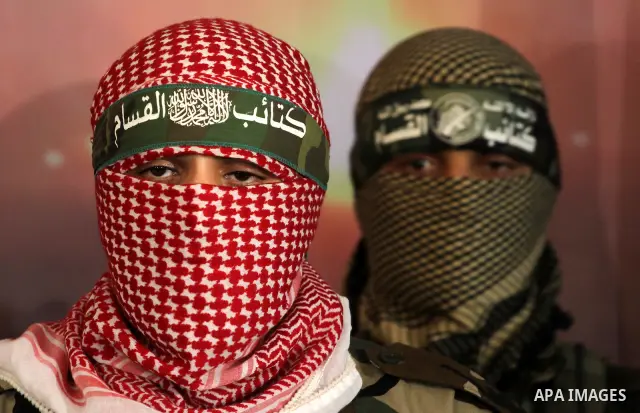The spokesman of Ezzedine al-Qassam Brigade, the military wing of the Palestinian Islamist movement Hamas which rules Gaza, Abo Obeda gives a press conference in Gaza City on Dec. 18, 2011, as Israel plans to release 550...