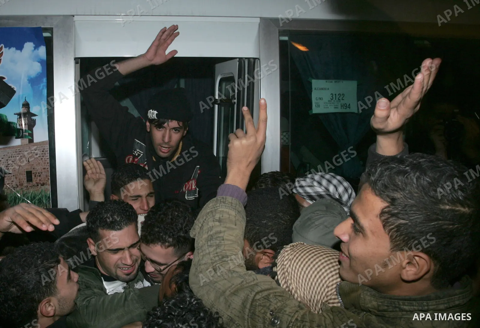 Freed Palestinian prisoners are greeted upon arrival at Rafah crossing in the southern Gaza Strip December 18, 2011. Israel plans to release 550 Palestinian prisoners on Sunday in the second stage of a deal with Hamas th...