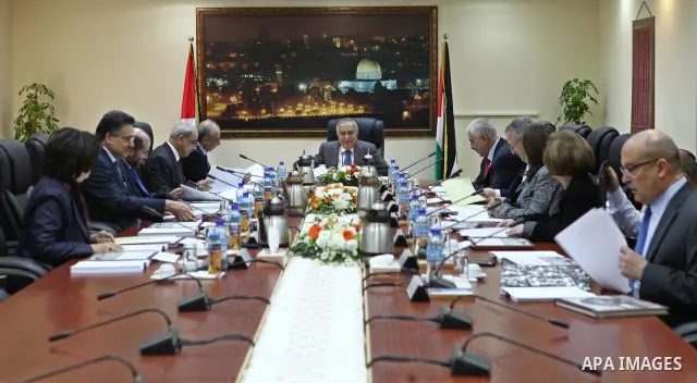 Palestinian Prime Minister Salam Fayyad, during a weekly meeting with the Palestinian Government, in the West Bank in Ramallah on Dec 20, 2011. Photo by Mustafa Abu Dayeh