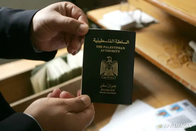 Palestinian employees working in a the Ministry of the Interior Department of Passports and visas for travel in Rafah, southern Gaza Strip December 21, 2011. Hamas spokesman Fawzi Barhoum,said that " he discussed the pro...