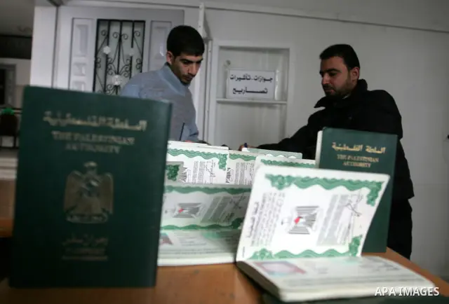 Palestinian employees working in a the Ministry of the Interior Department of Passports and visas for travel in Rafah, southern Gaza Strip December 21, 2011. Hamas spokesman Fawzi Barhoum,said that " he discussed the pro...