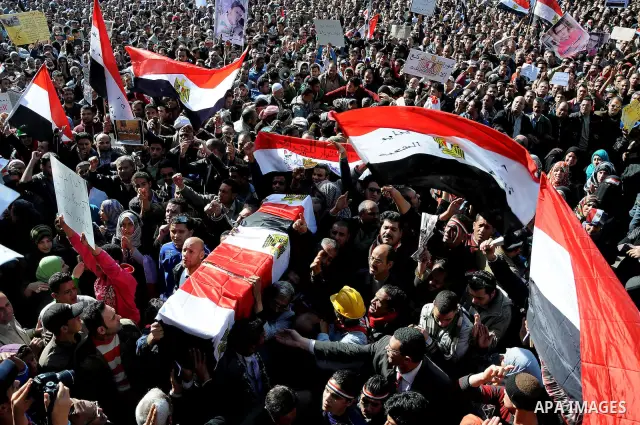 Egyptian protesters shout anti-military ruling council slogans during a protest at Tahrir Square, Cairo, Egypt Friday, Dec. 23, 2011. Several thousand Egyptians rallied in Cairo's central Tahrir Square Friday to denounce...