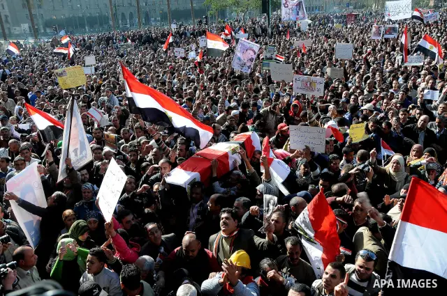 Egyptian protesters shout anti-military ruling council slogans during a protest at Tahrir Square, Cairo, Egypt Friday, Dec. 23, 2011. Several thousand Egyptians rallied in Cairo's central Tahrir Square Friday to denounce...