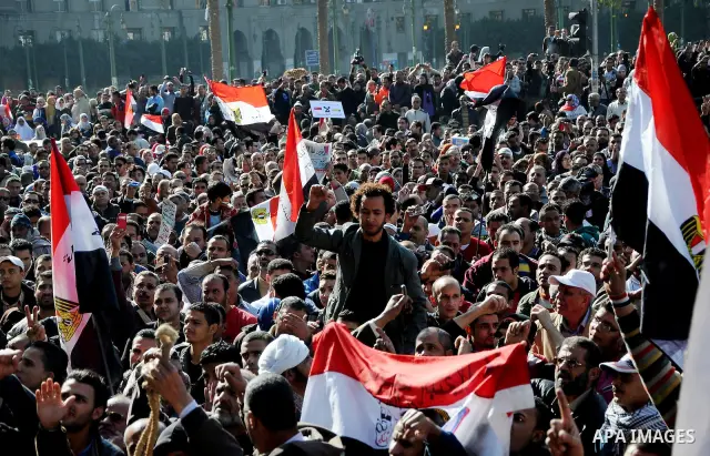 Egyptian protesters shout anti-military ruling council slogans during a protest at Tahrir Square, Cairo, Egypt Friday, Dec. 23, 2011. Several thousand Egyptians rallied in Cairo's central Tahrir Square Friday to denounce...