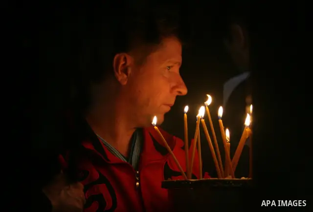 Christian pilgrims visit the Church of the Nativity in the biblical West Bank city of Bethlehem on 23 December 2011 as Christian pilgrims start gathering in the church belived to be the birthplace of Jesus Christ to cele...