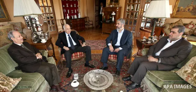 Arab League Secretary General Nabil al-Arabi (L) meeting with Hamas leader Khaled Meshaal (R) in Cairo, Egypt, 23 December 2011. According to media sources, Hamas on 22 December joined a committee aimed at reforming the...