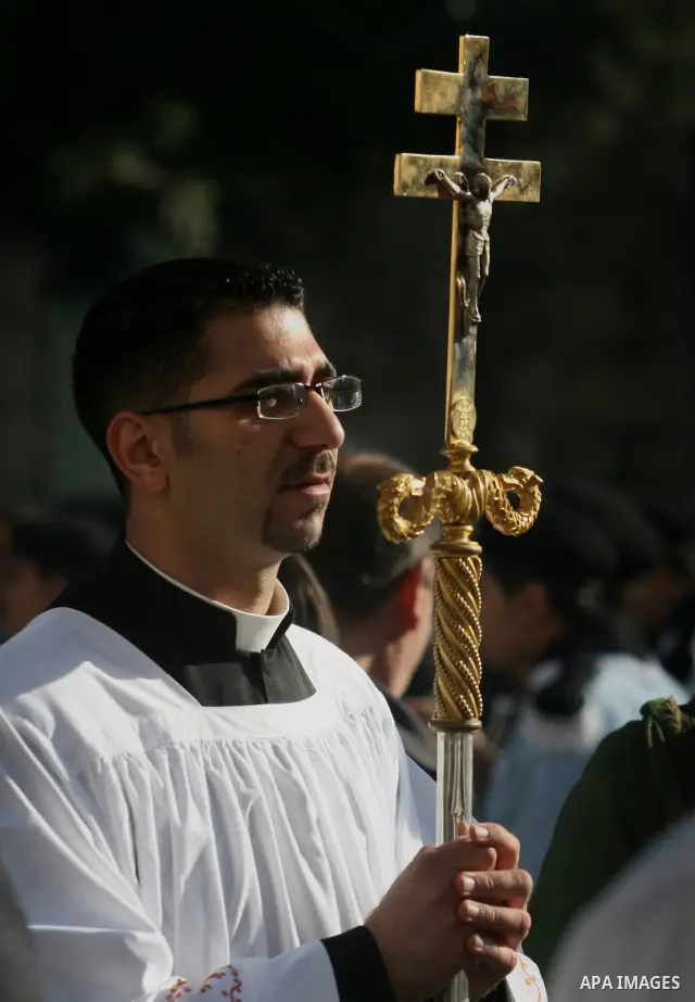 Christian pilgrims visit the Church of the Nativity in the biblical West Bank city of Bethlehem on Christmas Eve on 24 December 2011, as thousands of Christian pilgrims descended on the holy city to celebrate in Jesus' t...