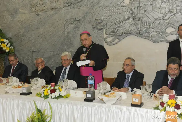 Palestinian President, Mahmoud Abbas (Abu Mazen) during participate in the 'Gala Dinner Birth' in the west bank city of Bethlehem, on Dec. 24, 2011. Photo by Thaer Ganaim