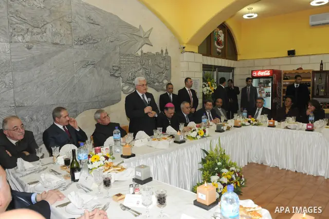 Palestinian President, Mahmoud Abbas (Abu Mazen) during participate in the 'Gala Dinner Birth' in the west bank city of Bethlehem, on Dec. 24, 2011. Photo by Thaer Ganaim