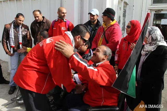 Palestinian members of the Paralympic Games for the disabled participate in training at Al-Gezira Club in Gaza city on Dec. 25, 2011. Palestinian Paralympic Games won Arab and international medals and have achieved excel...
